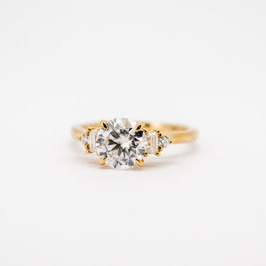 Beautiful 10 Karat Solid Gold Round Cut Diamond and Baguette Ring from Boujee Ice