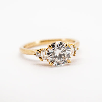 Beautiful 10 Karat Solid Gold Round Cut Diamond and Baguette Ring from Boujee Ice