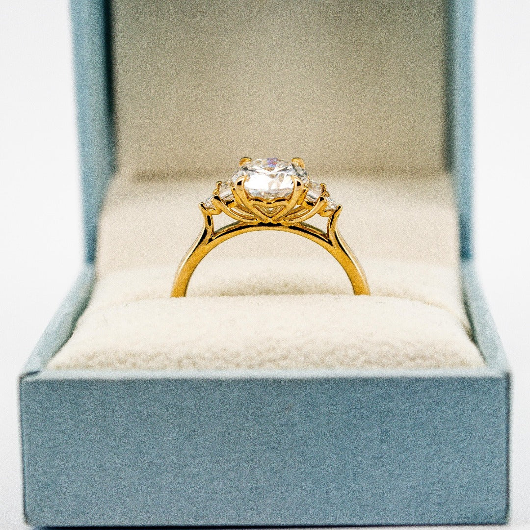 Beautiful 10 Karat Solid Gold Round Cut Diamond and Baguette Ring from Boujee Ice