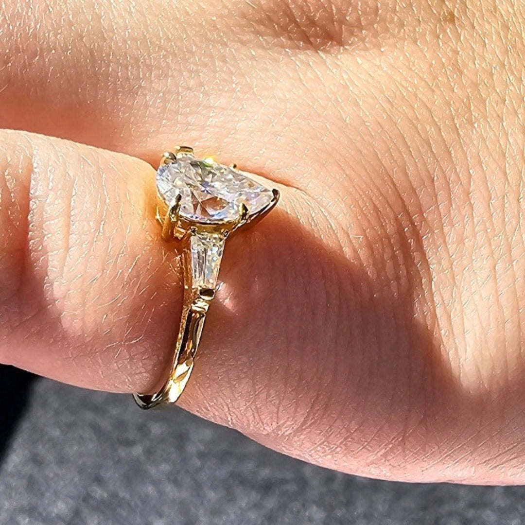 Pear Cut Diamond Centre Stone with Shoulder Stones Ring in Solid Gold by Boujee Ice