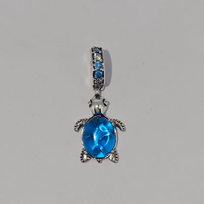 Sterling Silver Turtle Glass Charm in Blue or Pink for Charm Bracelets at Boujee Ice
