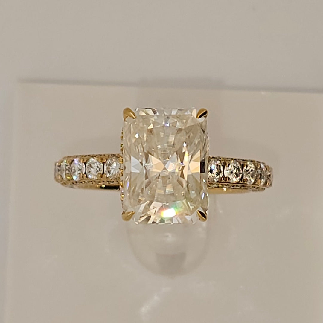 Stunning Radiant Cut Solitaire Diamond with Halo . Set in Solid Gold. Perfect EngagementRing with 270 Degree Diamond Band from Boujee ice