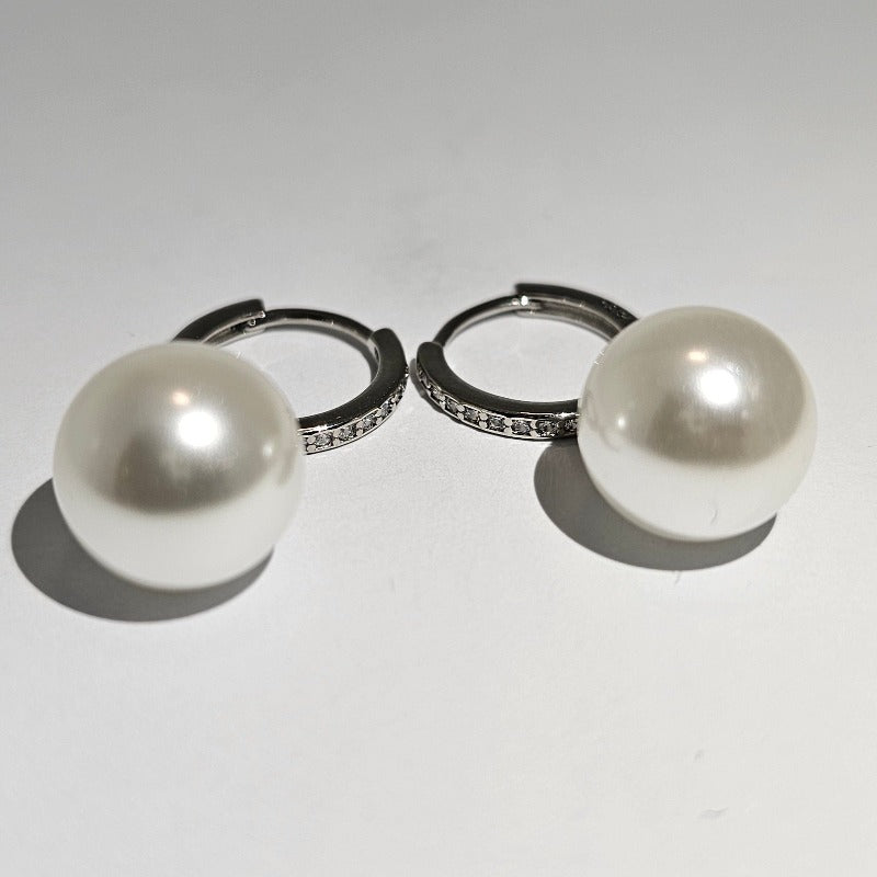 Beautiful Sterling Silver with Natural Freshwater Pearls in a crystal drop earring styleTrending Freshwater Pearl Sterling Silver Crystal Earrings from Boujee Ice