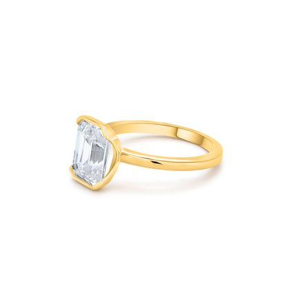 Trending 14 Karat Solid Gold Emerald Cut Diamond Solitaire Bezel Set Ring from Boujee Ice