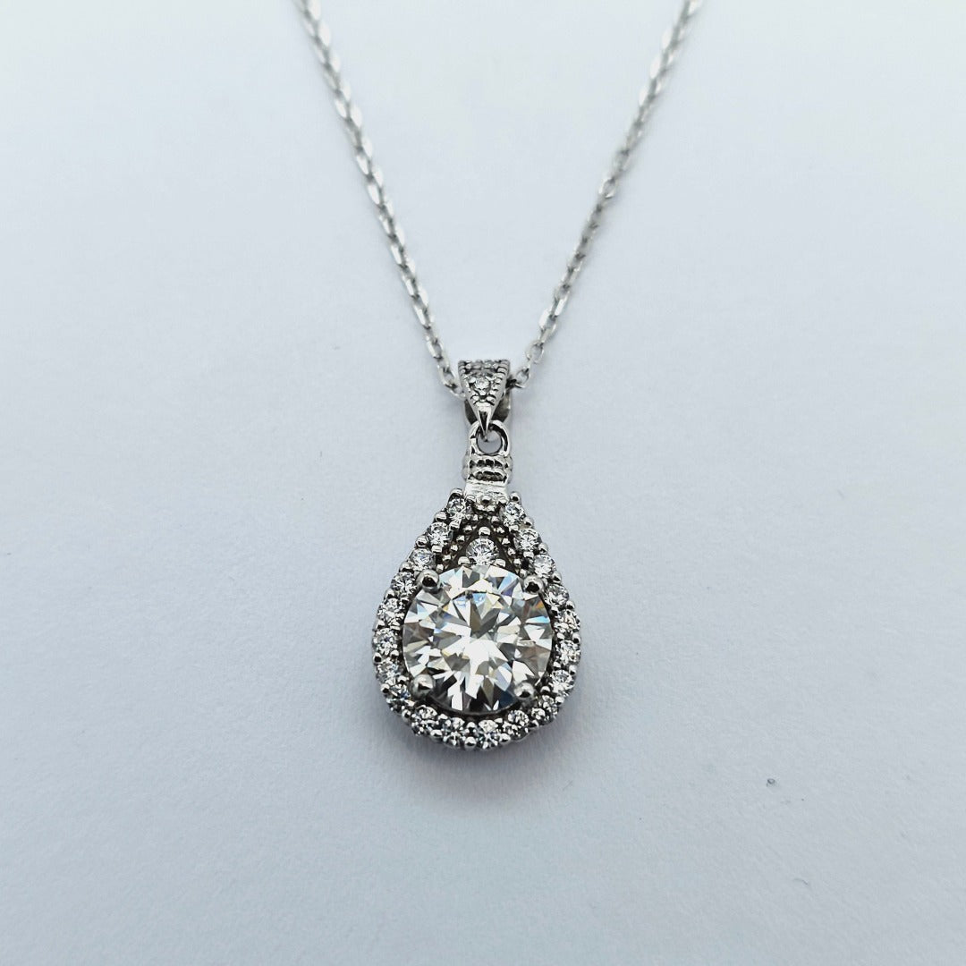 Two Styles of Drop Pear Shaped Diamond Princess Pendant Necklace from Boujee Ice