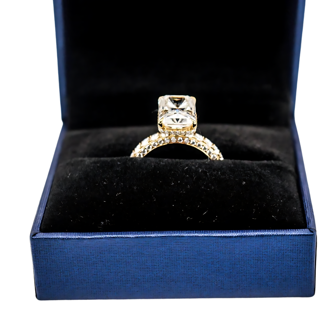 Stunning Radiant Cut Solitaire Diamond with Halo . Set in Solid Gold. Perfect EngagementRing with 270 Degree Diamond Band from Boujee ice