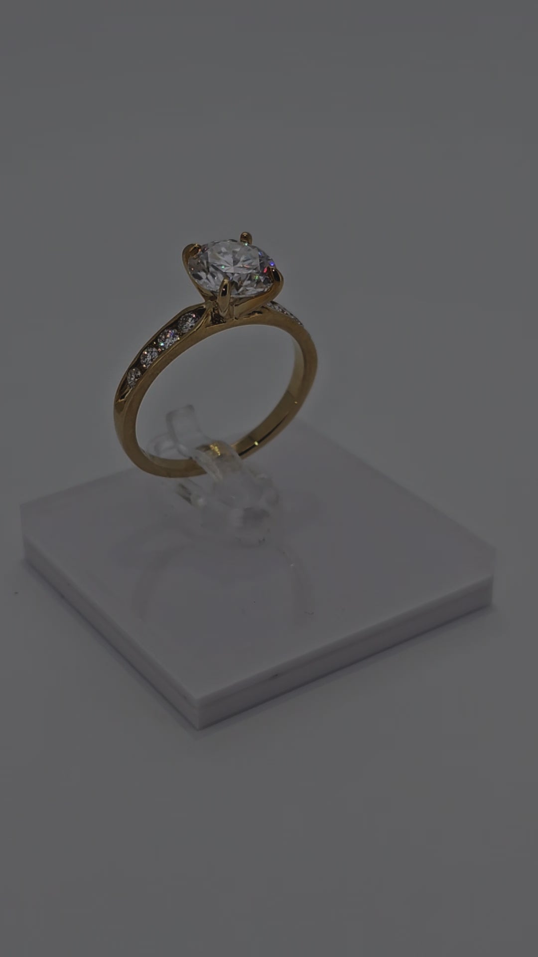 Video of Luxury Beautiful 10 Karat Solid Gold Brilliant Cut Diamond Solitaire with Bezel Set Diamond Band from Boujee Ice