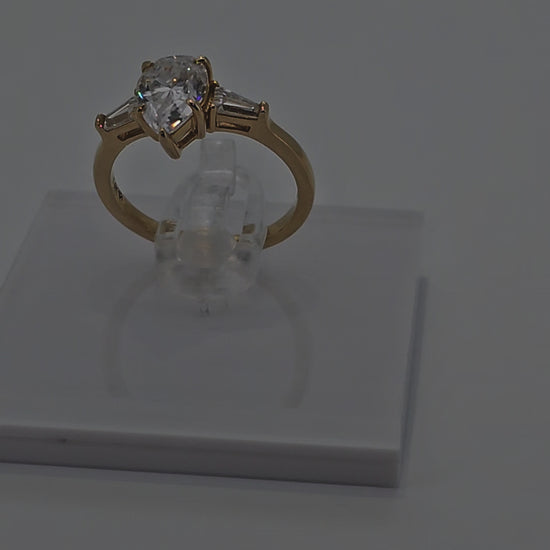 Video of Pear Cut Diamond Centre Stone with Shoulder Stones Ring in Solid Gold by Boujee Ice
