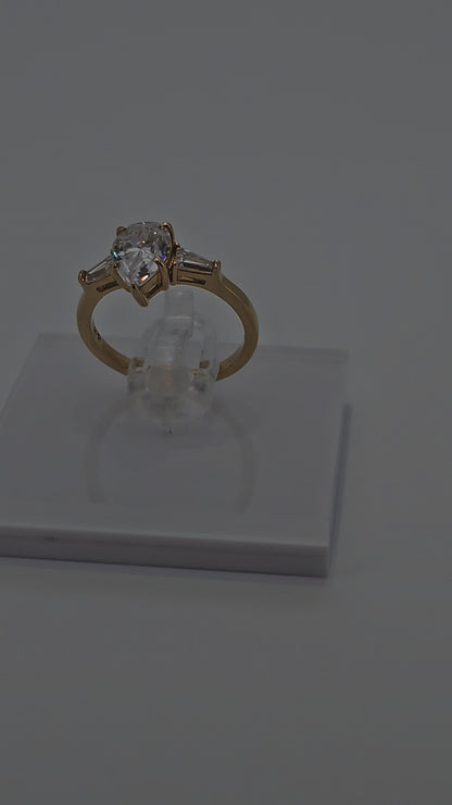 Video of Pear Cut Diamond Centre Stone with Shoulder Stones Ring in Solid Gold by Boujee Ice