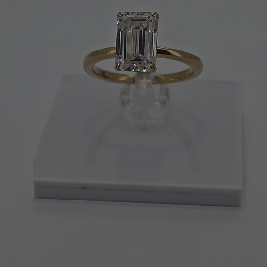 Video of Lavish 4 Carat Solid Gold Emerald Cut Diamond Solitaire Ring from Boujee Ice