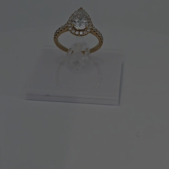 Video of 14 Karat Solid Gold Pear / Tear Drop Cut Luxury Diamond Ring from Boujee Ice