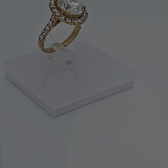 Video of Luxurious Oval Cut Solitaire Solid Gold Diamond Ring with Halo and Pave Band by Boujee Ice
